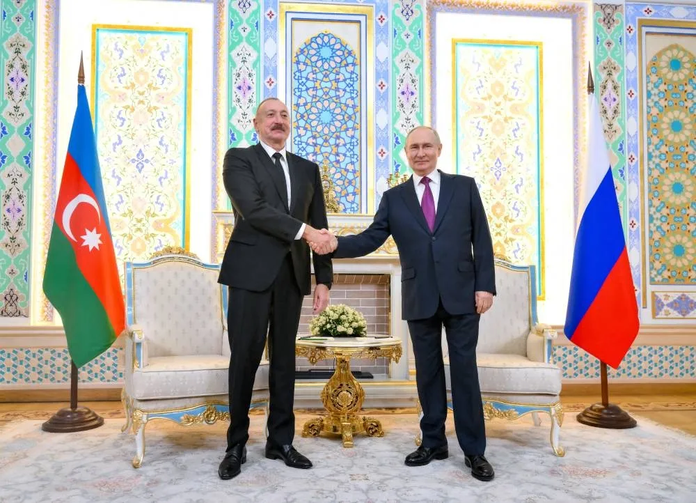 Putin with Aliyev during their meeting in Dushanbe, Tajikistan, yesterday. – Reuters
