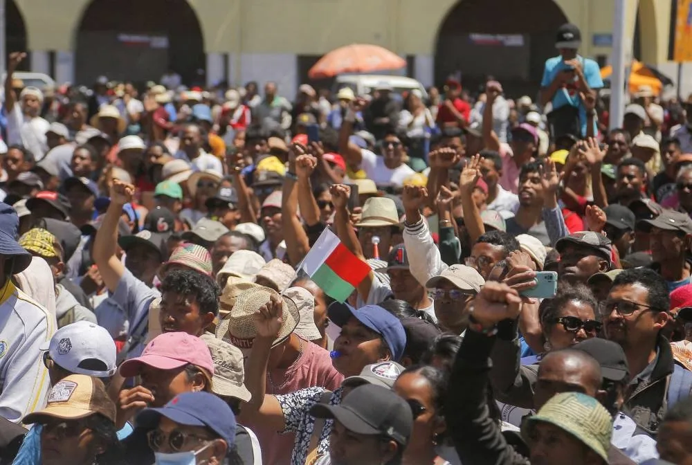 Protesters gather outside the town hall on Independence Avenue during a nationwide youth-led demonstration against frequent power outages and water shortages, in Antananarivo, Madagascar, on Tuesday. REUTERS