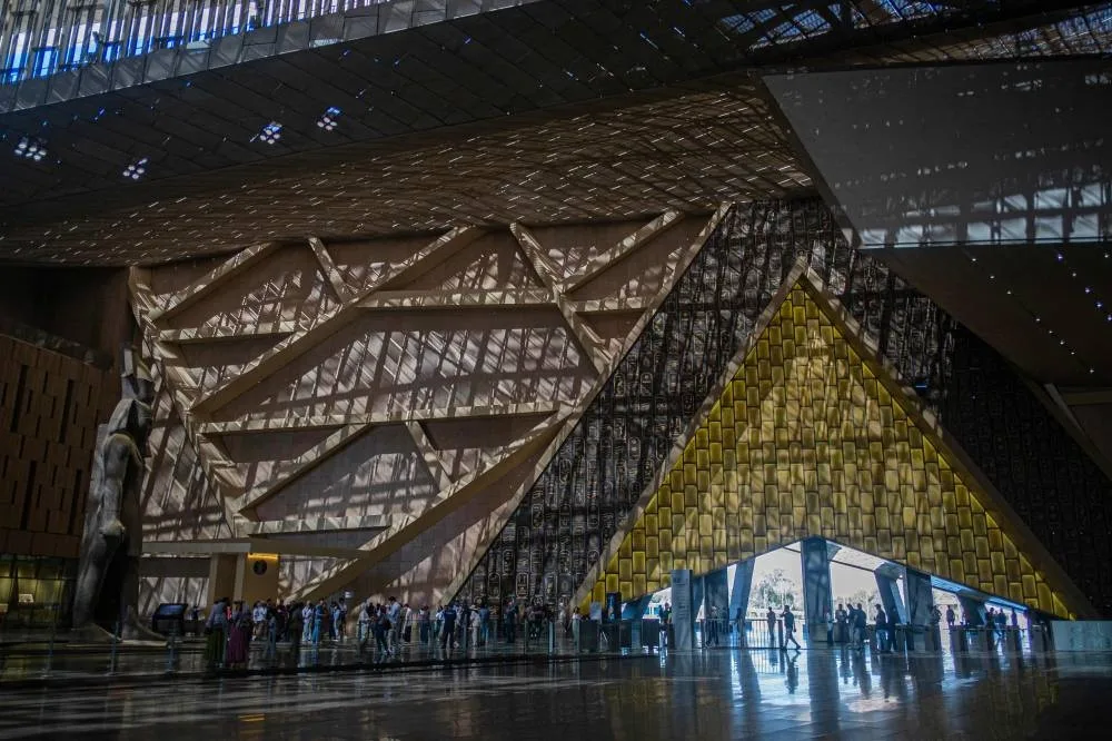 (FILES) Visitors tour the Grand Egyptian Museum in Giza on the southwestern outskirts of the capital Cairo on May 5, 2025.  (AFP)