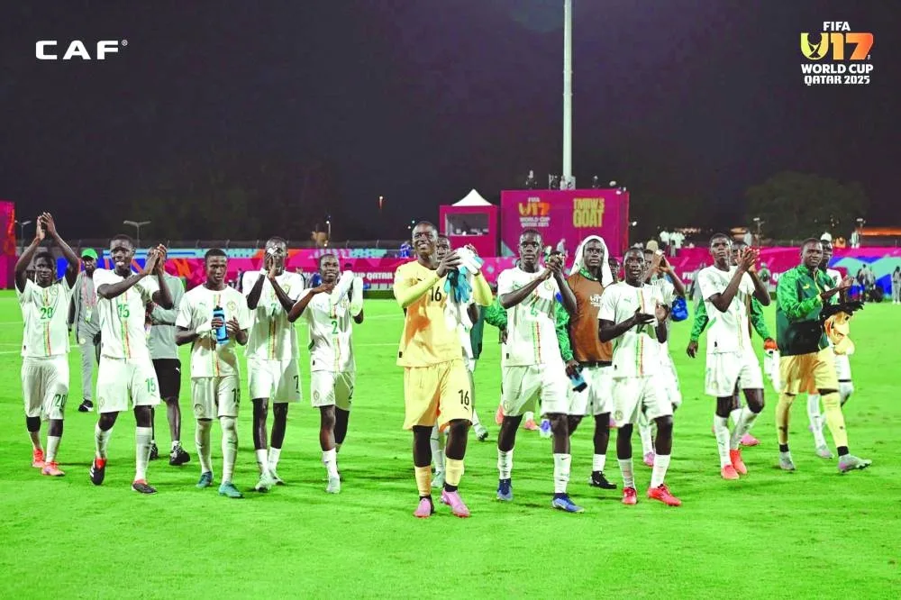 Mali players celebrate after beating Saudi Arabia and seal their place in the the last 32.