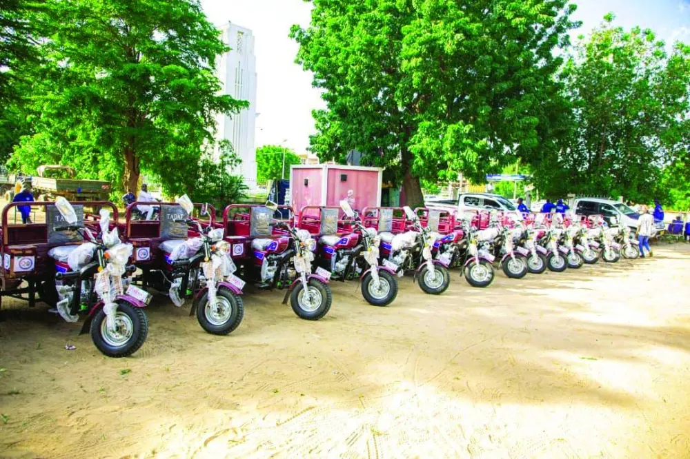 QC distributes 130 three-wheeled motorcycles and 130 auto rickshaws in Chad.
