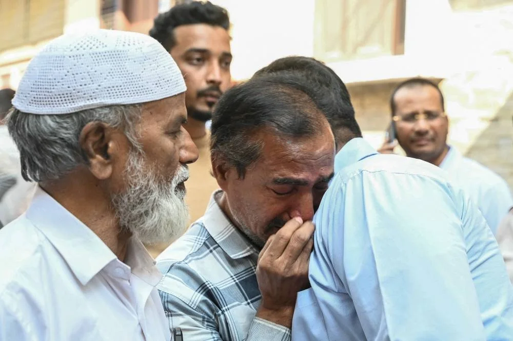 Family members and relatives of victims, who were killed in a bus accident near the holy city of Medina, mourn in Hyderabad on November 17, 2025. The Indian embassy in Saudi Arabia on November 17 said a "tragic" bus crash involving Muslim pilgrims occurred near the holy city of Medina overnight, with India&#039;s Prime Minister Narendra Modi offering his condolences.