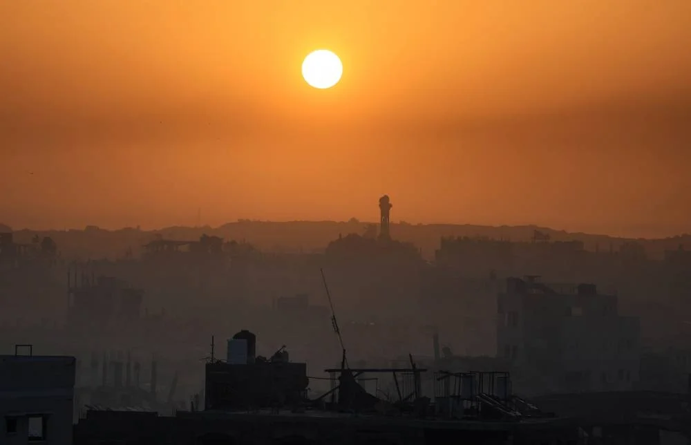 A view of Gaza City at sunrise, amid a ceasefire between Israel and Hamas, November 19, 2025. REUTERS/Dawoud Abu Alkas