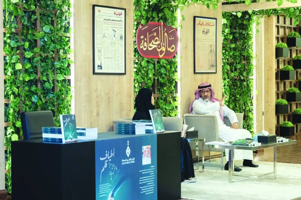 Dr Abdullah al-Emadi (right) is seen at the event.