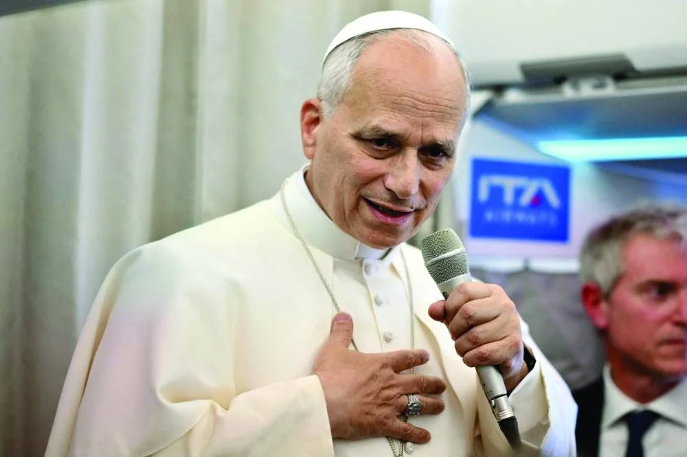 Pope Leo XIV speaks to journalists aboard a flight to Rome at the end of his journey to Turkiye and Lebanon, yesterday.