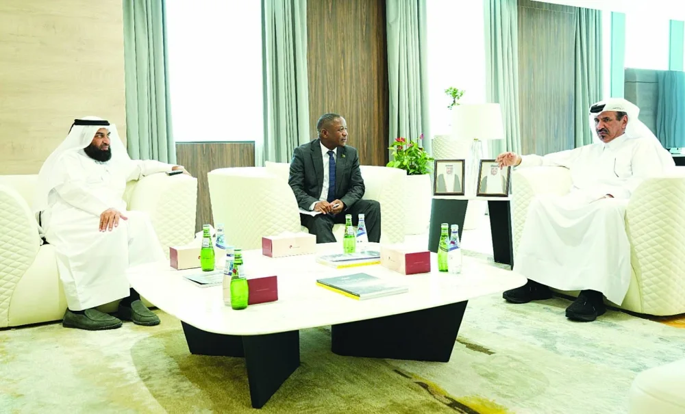 Al-Kuwari and Zambian embassy charge d&#039;affaires Stanley Katshabi in a huddle while Qatar Chamber board member Dr Mohammed bin Jawhar al-Mohammed looks on.