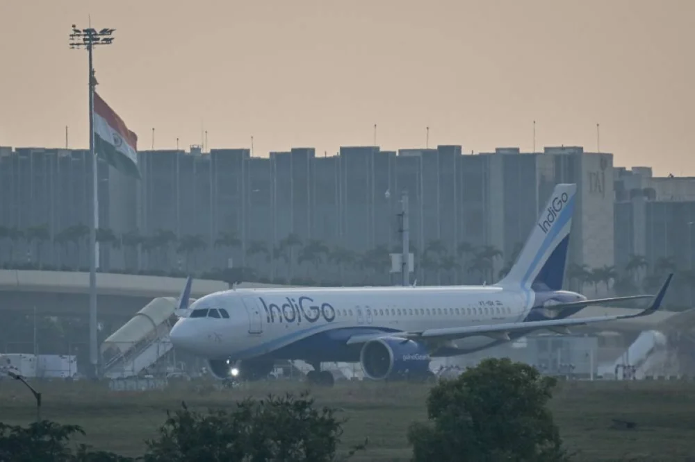 An IndiGo Airlines aircraft prepares to take off at Kempegowda International Airport on a hazy day in Bengaluru on December 9, 2025. India's biggest airline, IndiGo, said on December 9 its operations had stabilised after it cancelled thousands of flights, triggering days of airport chaos -- sparked by a since-suspended new pilot rest policy. (AFP)