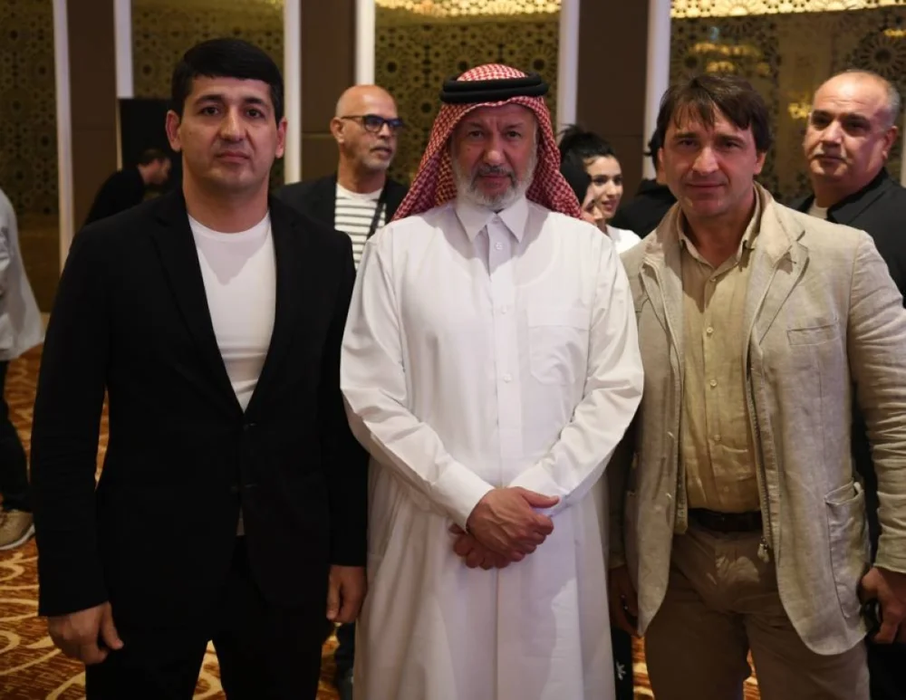 Mohammed bin Yousef Al Mana, President of the AWF, Vice President of the International Weightlifting Federation (IWF), President of the Qatar Weightlifting Federation (QWF), President of the Asian Weightlifting Federation, and President of the Afro‑Asian Weightlifting Council of Weightlifting, is seen with visiting dignitaries. 