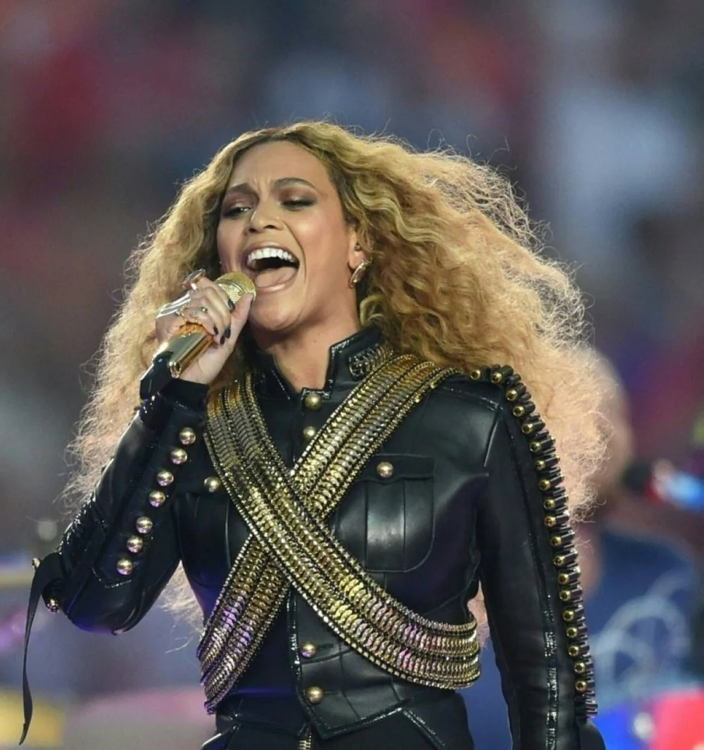 (FILES) Beyonce performs during Super Bowl 50 between the Carolina Panthers and the Denver Broncos at Levi's Stadium in Santa Clara, California, on February 7, 2016. Beyoncé officially reached billionaire status after a highly lucrative year, Forbes reported December 29, becoming the fifth singer to achieve this milestone. (AFP)