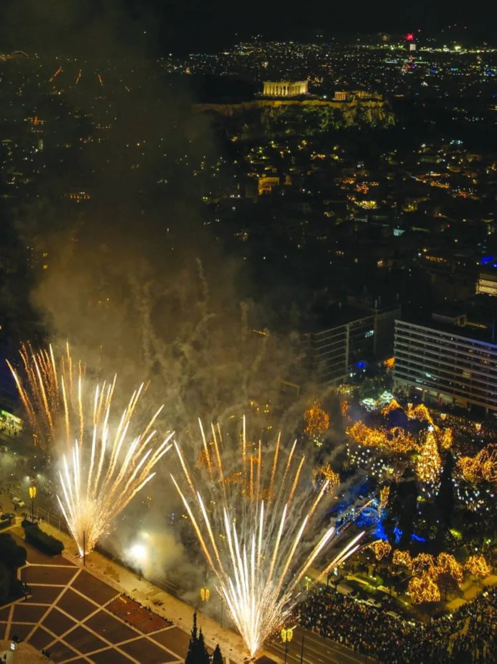 A drone view shows fireworks exploding over Athens as the ancient Parthenon is illuminated during New Year's celebrations in Greece.