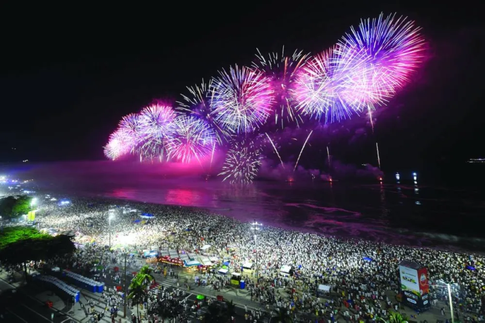 Fireworks to celebrate the New Year explode on Copacabana Beach during celebrations in Rio de Janeiro, Brazil.