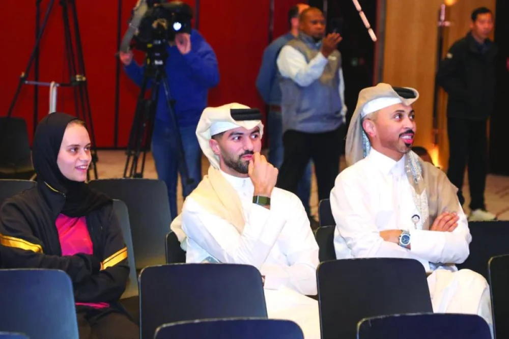 
Qatar table tennis players Aia Mohamed and Mohammed Abdulwahhab are seen during the draw ceremony of the WTT Champions Doha 2026. 