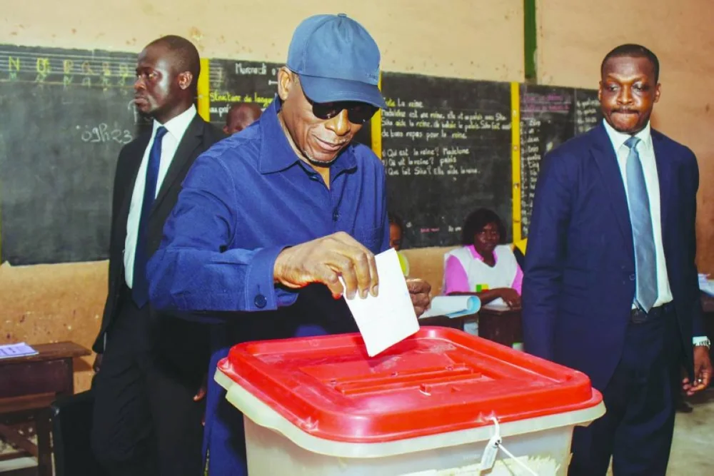 Benin's President Patrice Talon votes at a polling station during the country's parliamentary election, in Cotonou, Benin, January 11, 2026. REUTERS