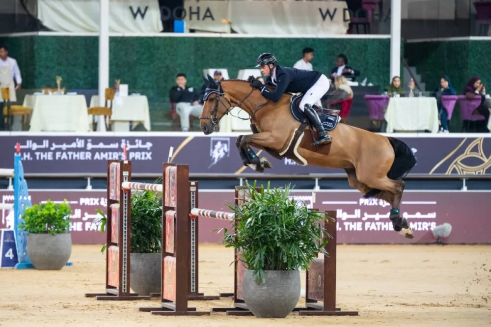 Germany's Christopher Kläsener onboard Popeye Vd Bisschop clears a rail in the CSI5* 155cm jump-Off during the the third round of the HH The Father Amir's Prix at Al Shaqab yesterday,