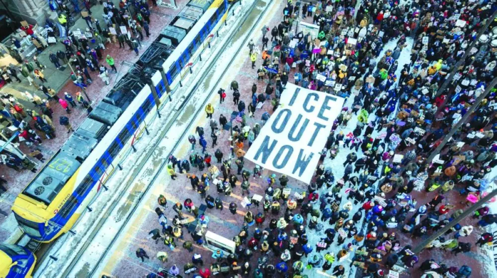 Demonstrators gather in Minneapolis to march calling for an end to ICE operations in Minnesota. – AFP