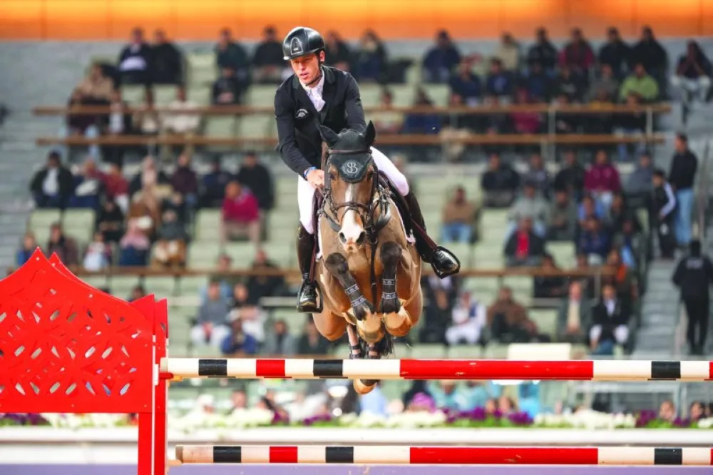 Britain's Scott Brash clears a rail with 17-year-old bay gelding Hello Jefferson in the 1.60m class