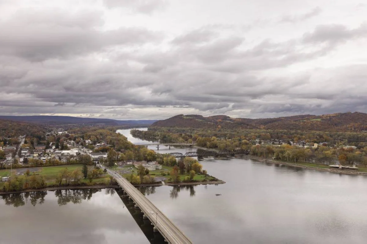 POINT TOWNSHIP: The confluence of the West Branch of the Susquehanna and the Susquehanna River is seen from Shikellamy State Park Overlook just downriver from Point Township, Pennsylvania on October 30, 2023. - AFP
