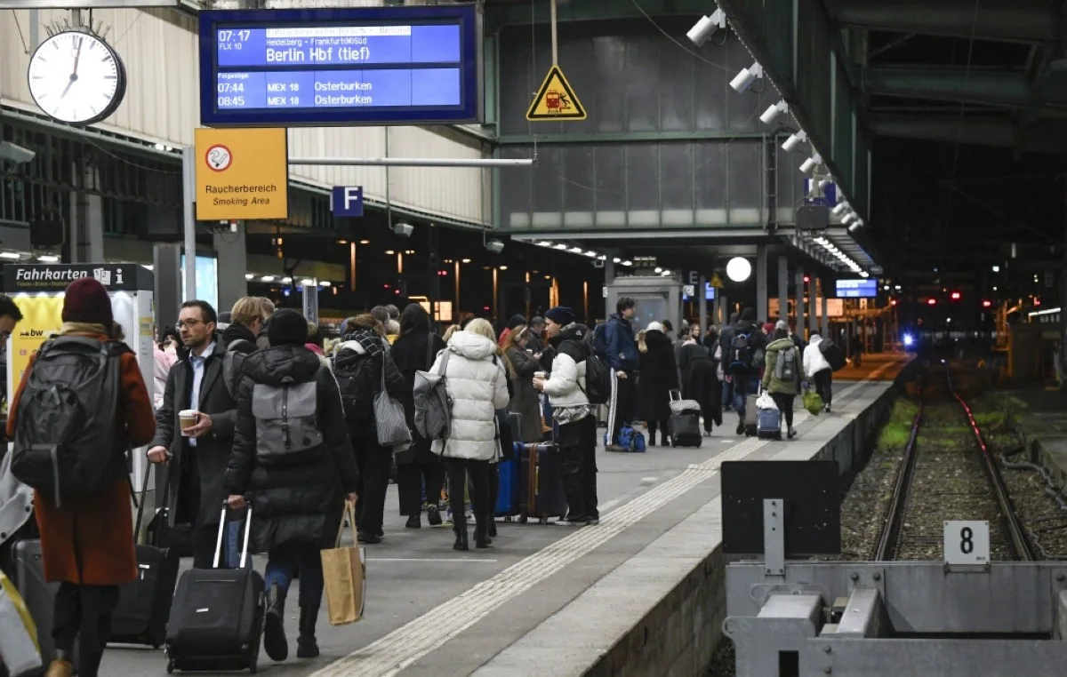 STUTTGART: Passengers wait on a platform for a train of private railway operator Flixtrain at the main railway station in Stuttgart, southern Germany, on early January 24, 2024, on the first day of a six-day train drivers’ strike of Deutsche Bahn. — AFP
