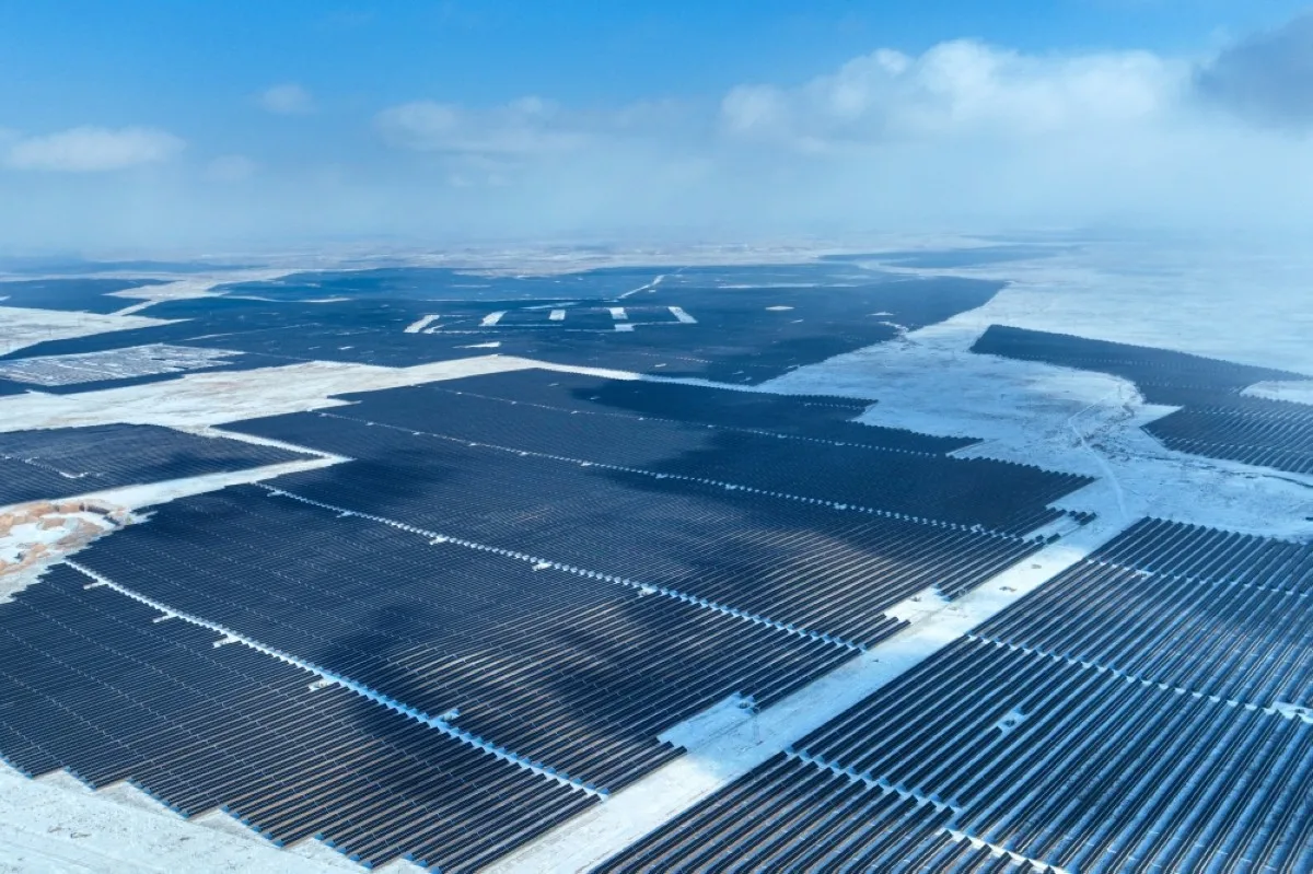 YINCHUAN: This aerial photo taken shows solar panels in the snow-covered Gobi desert in Yinchuan, in China’s northern Ningxia region.- AFP