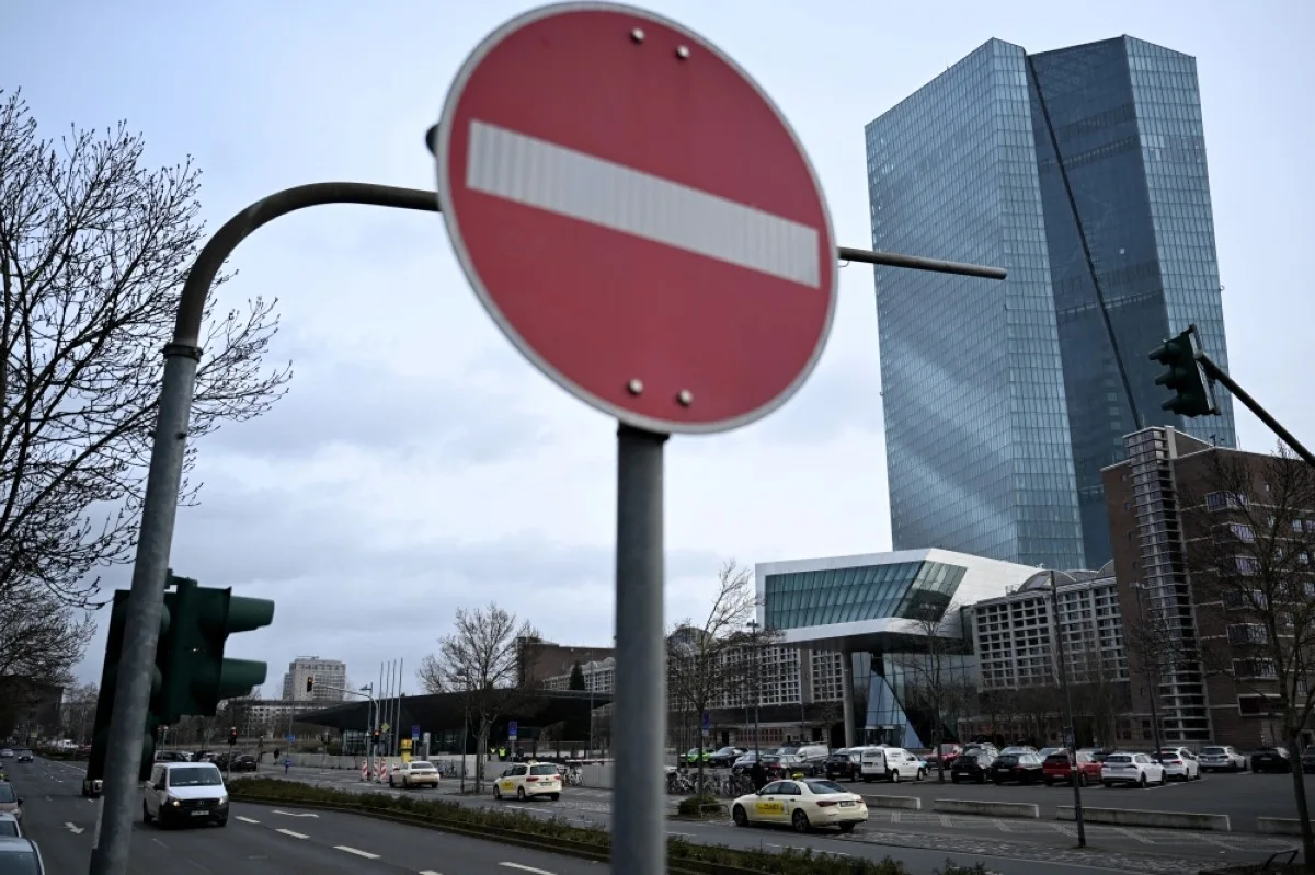 FRANKFURT: The headquarters of the European Central Bank (ECB) is seen behind a traffic sign in Frankfurt am Main, western Germany. - AFP