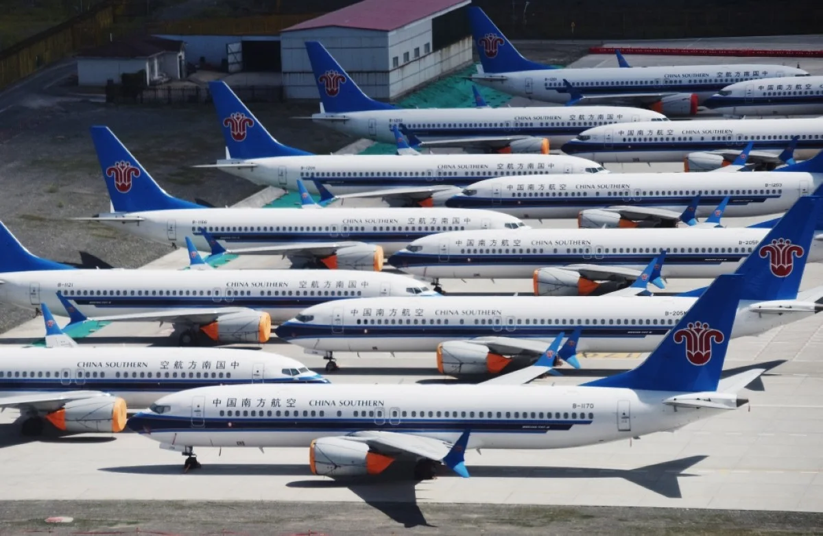 URUMQI, China: This photo taken on June 5, 2019 shows grounded China Southern Airlines Boeing 737 MAX aircraft parked in a line at Urumqi airport, in China&#039;s western Xinjiiang region. -- AFP

