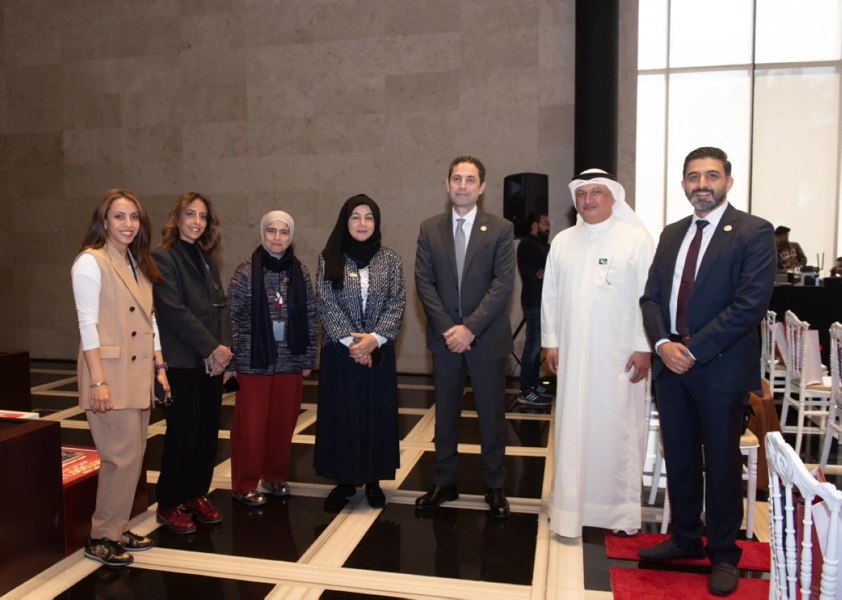 A group picture featuring several executives of Gulf Bank with the Deputy CEO in the center.