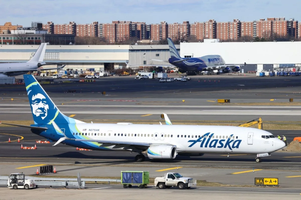NEW YORK: A Boeing 737-900er Alaska Airlines passenger aircraft taxis at John F Kennedy International Airport in New York City on January 8, 2024. -- AFP