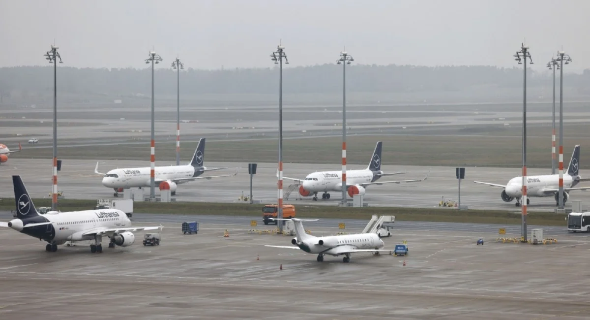 SCHONEFELD: Lufthansa airplanes stand on the ground at the Berlin Brandenburg Airport in Schoenefeld near Berlin.- AFP
