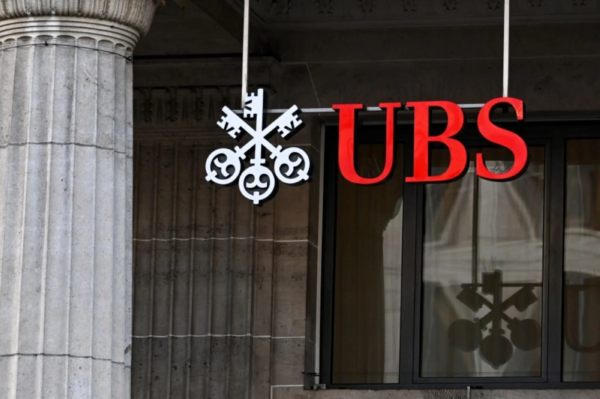 LAUSANNE, Switzerland: A sign and logo of the Swiss giant banking UBS is seen in Lausanne on February 6, 2024. AFP

