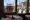 تُظهر هذه الصورة النسخة الجديدة من الترام الكهربائي الحديث باللونين الأحمر والأبيض الذي يعمل بالبطارية من خلال نافذة النسخة القديمة من الترام الذي يعمل بخطوط الكهرباء العلوية التقليدية (REAR) في شارع تقسيم استقلال، في إسطنبول.