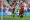 حارس مرمى جورجيا رقم 25 جيورجي مامارداشفيلي (في الوسط) يسدد الكرة بعيدًا خلال مباراة كرة القدم للمجموعة السادسة في بطولة أمم أوروبا 2024 بين جورجيا وجمهورية التشيك في ملعب فولكسباركستاديون في هامبورغ في 22 يونيو 2024. – AFP