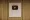 لوحة تثبت لي كيونغ هيون، وهي شامان مشهورة على YouTube، لتجاوزها 100 ألف مشترك على YouTube، معلقة على الحائط في صالون الشامان الخاص بها في سيول.
