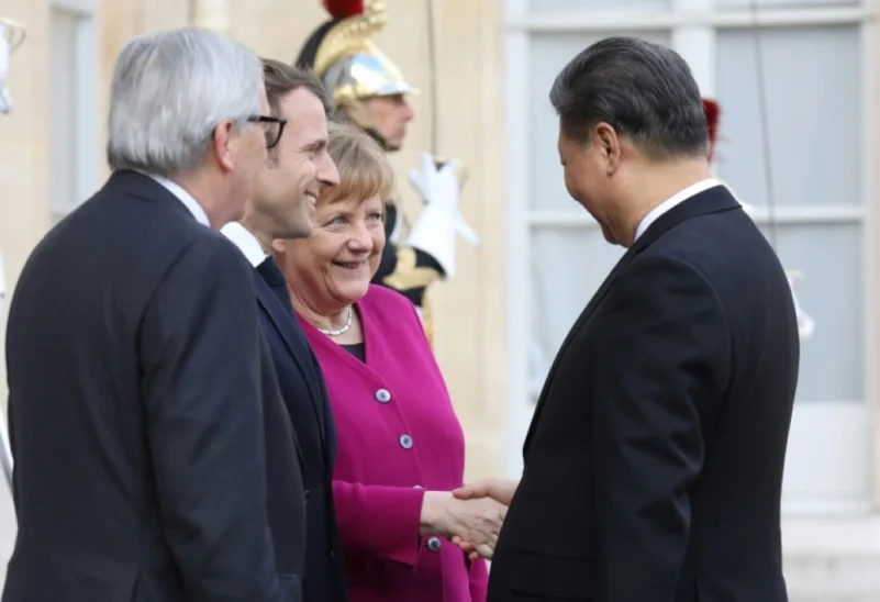ماكرون وميركل ويونكر يبحثون وحدة صف أوروبية بمواجهة الصين