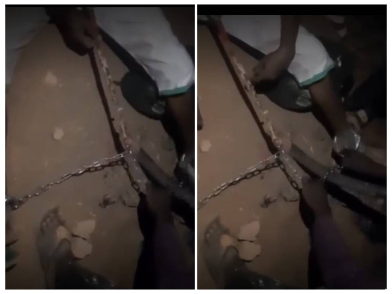 شاهد.. سجين سوداني هارب من ⁧"سجن كوبر‬⁩ " يحاول التخلص من قيوده الحديدية باستخدام مطرقة