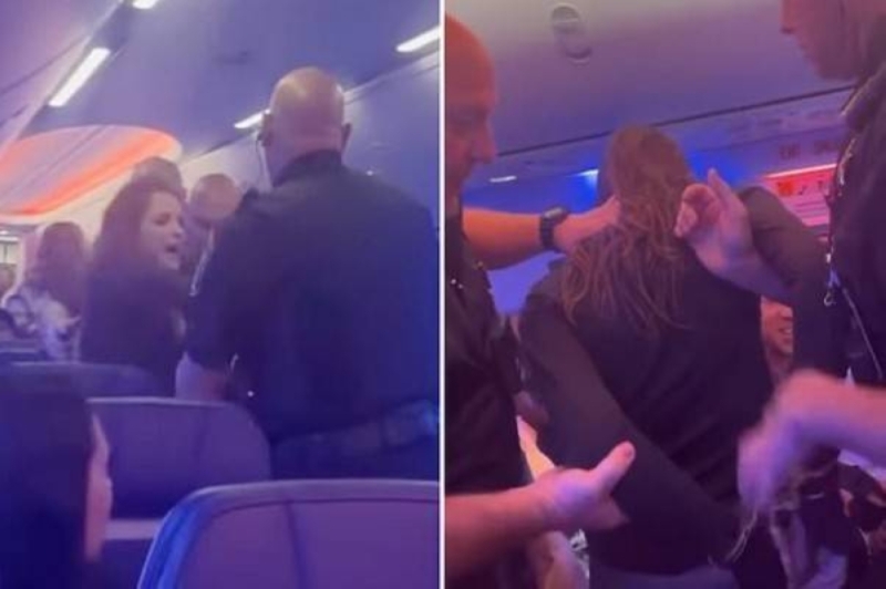 شاهد: الشرطة الأمريكية تلقي القبض على امرأة "سكرانة" داخل طائرة وتخرجها بالقوة