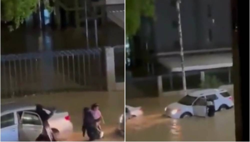 شاهد.. فتاة توقف سيارتها وتنقذ عائلة من الغرق في سيول عنيزة