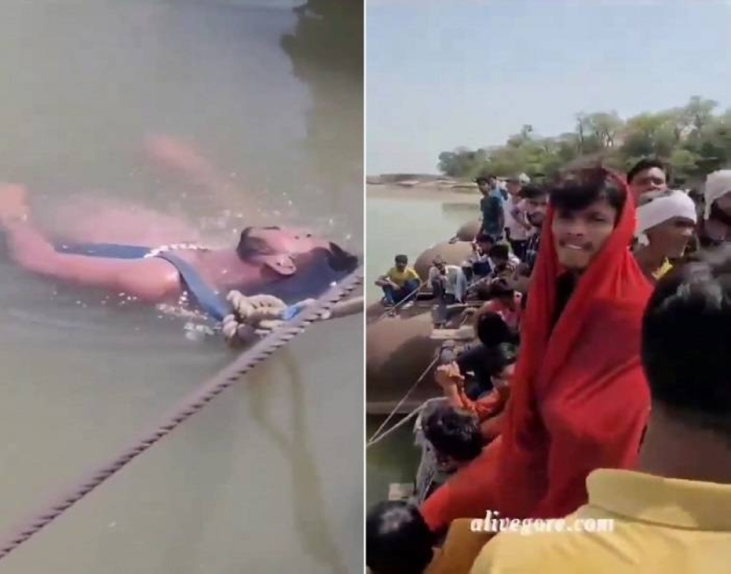 "لإيمانهم بالخرافة" .. شاهد: ربط هندي ميت في نهر مقدس لدى الهندوس لاعتقادهم أن المياه ستعيده للحياة!