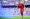 حارس مرمى أستون فيلا روبن أولسن يُبعد قنبلة دخانية خلال المباراة مع مانشستر سيتي (أ ف ب)