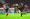 
مدافع أتلتيكو مدريد خوسي ماريا خيمينيز في صراع على الكرة مع لاعب باير ليفركوزن باولينيو 	(رويترز)
