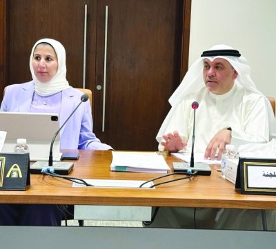 حسن كمال وعلياء الفارسي خلال الاجتماع