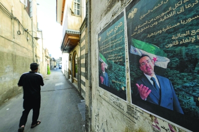 دعاية انتخابية لهنري حمرة (أ ف ب)