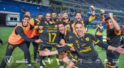 لاعبو القادسية يحتفلون
