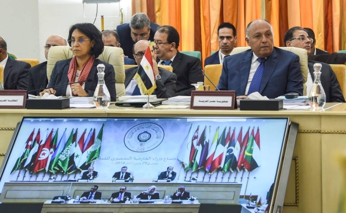 Egyptian Foreign Minister Sameh Shoukry (R) and Mounia Boucetta (L), Morocco's Secretary of State for Foreign Affairs and International Cooperation, attend the preparatory meeting for Arab League foreign ministers in Tunis on March 29, 2019 ahead of the 30th annual Arab League summit. (Photo by FETHI BELAID / AFP)
