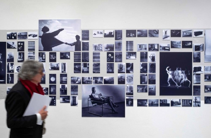 Photographs depicting life at the bauhaus are on display at the new Bauhaus museum in Weimar, eastern Germany, on April 4, 2019. - The Bauhaus design school, which transformed the way people around the world live, work and dream of the future, marks its centenary with the launch of the politically charged museum on April 6, 2019. The sprawling museum in Bauhaus's birthplace of Weimar, a small city 250 kilometres (150 miles) southwest of Berlin, will display the classics of its less-is-more, form-follows-function aesthetic. (Photo by John MACDOUGALL / AFP) / RESTRICTED TO EDITORIAL USE -  MANDATORY MENTION OF THE ARTIST IN THE CAPTION  - TO ILLUSTRATE THE EVENT AS SPECIFIED IN THE CAPTION