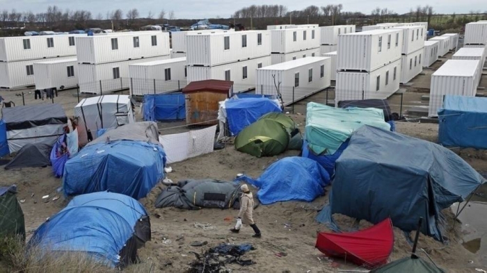 مخيم كاليه في باريس الذي فككته فرنسا لاحقاً (الوكالات)