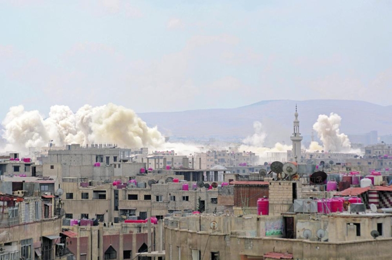 طائرات الأسد وروسيا تكثف غاراتها على أحياء جنوب دمشق