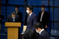 اليابان تتطلع لإنهاء حالة الطوارئ في طوكيو