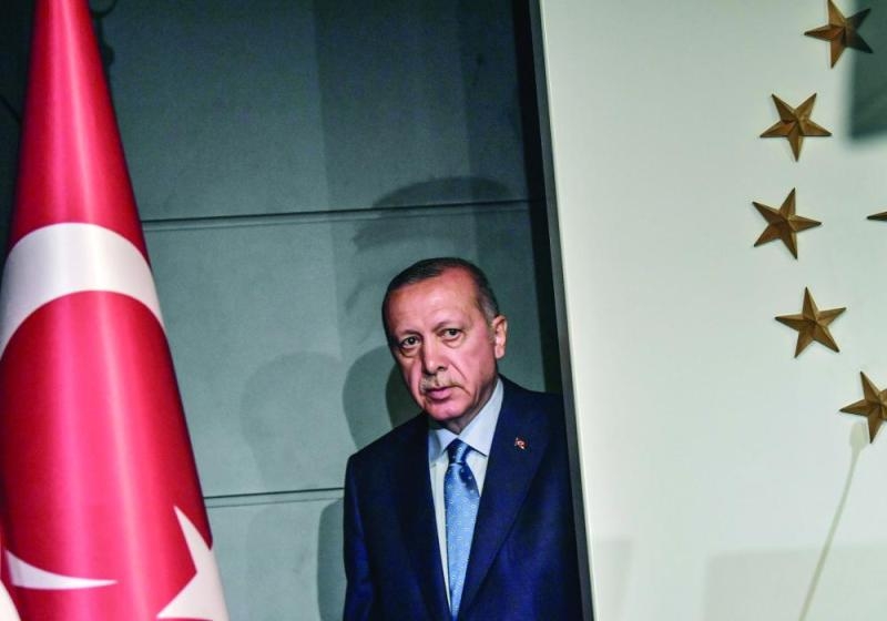 أردوغان يخطط للسيطرة على أكبر بنك خاص في تركيا