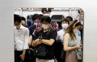 اليابان تسجل أعلى إصابات يومية بكورونا 
