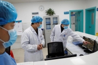 الصين .. 12 حالة إصابة جديدة بفيروس كورونا